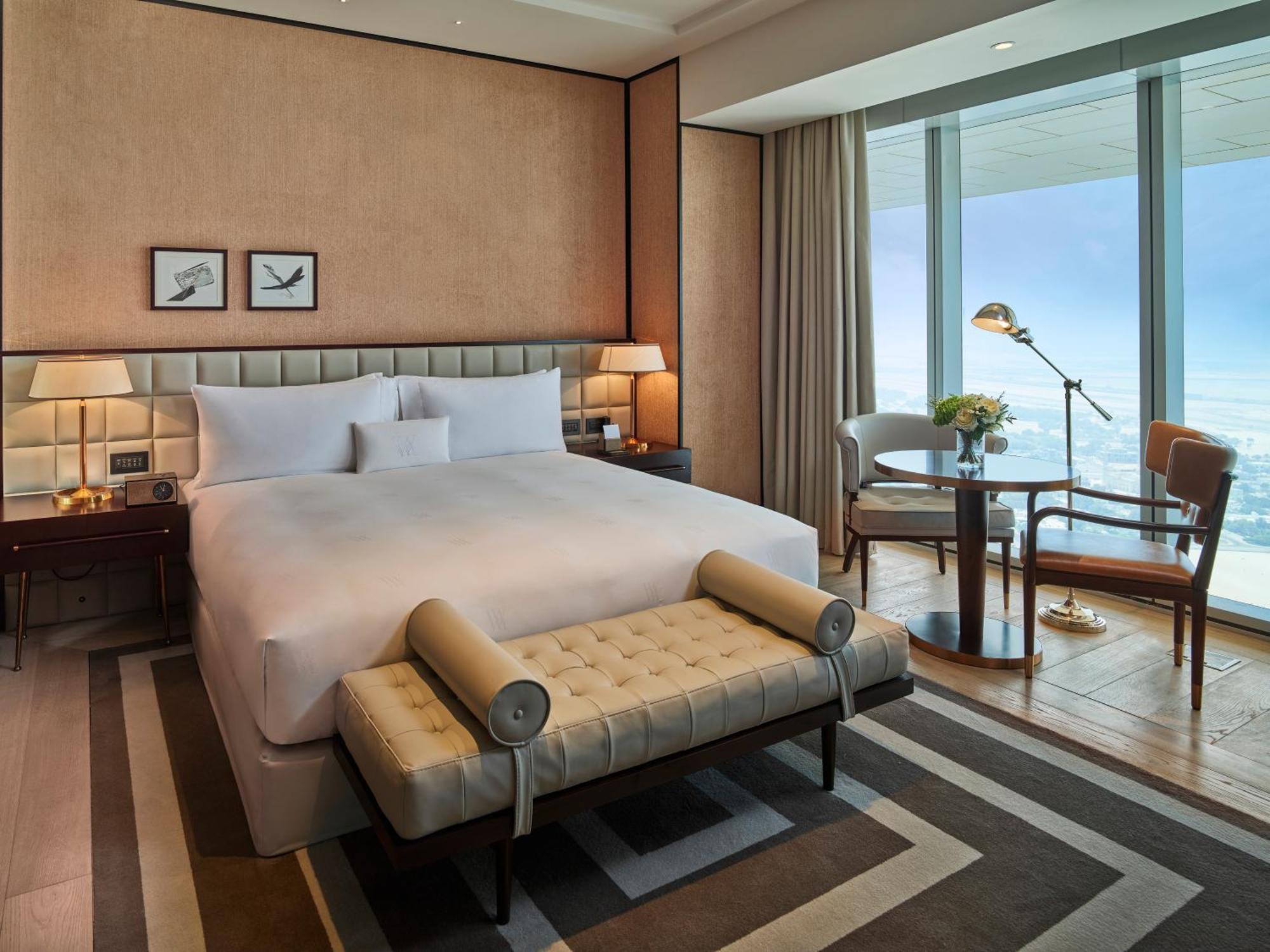 Waldorf Astoria Dubai International Financial Centre Hotel Kültér fotó A bedroom at the Ritz-Carlton, DIFC